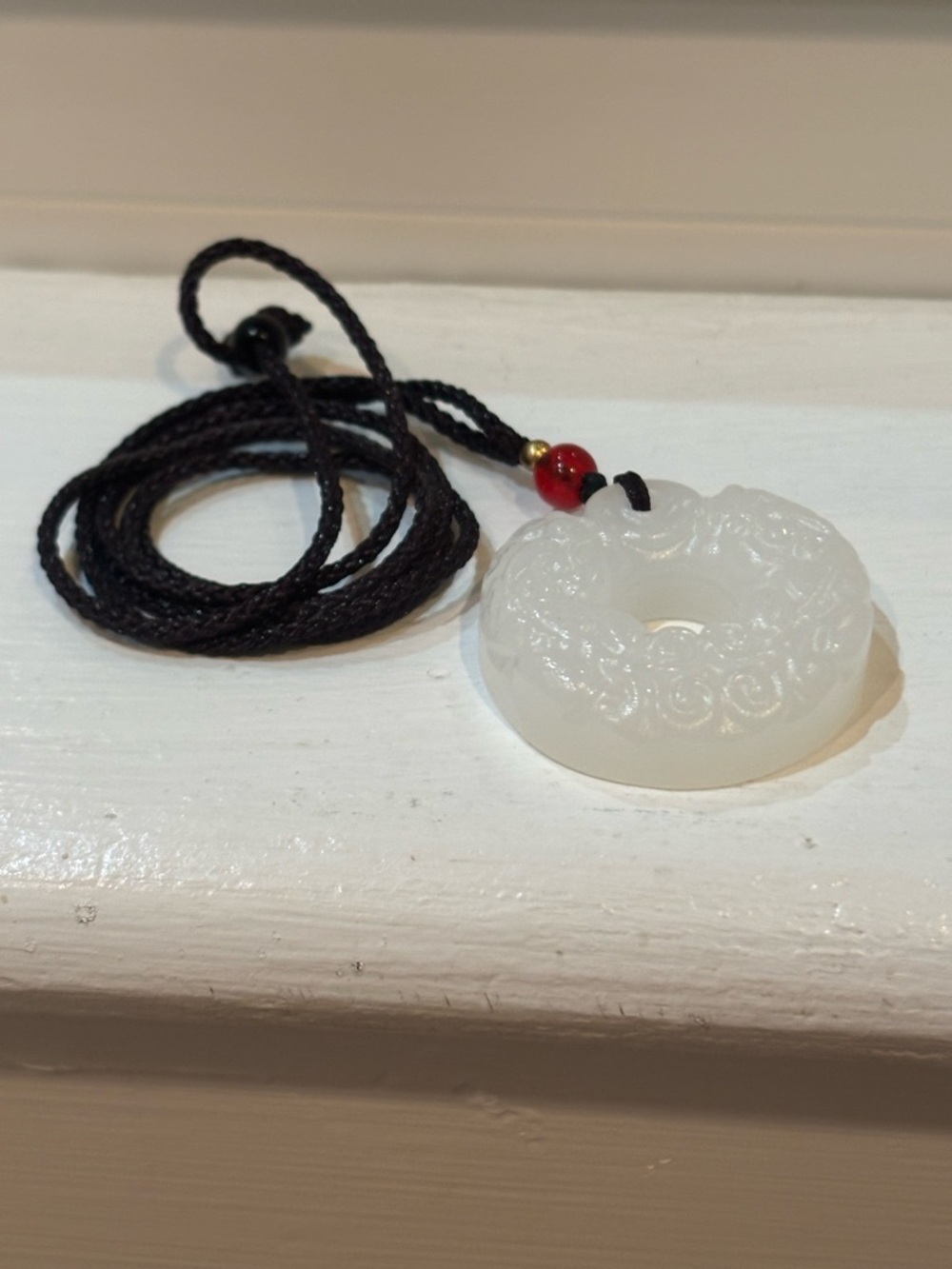 White gemstone carved donut pendant